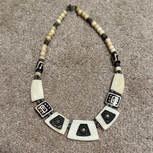 Handcrafted bone and wood Beaded Necklace with Tribal Accents